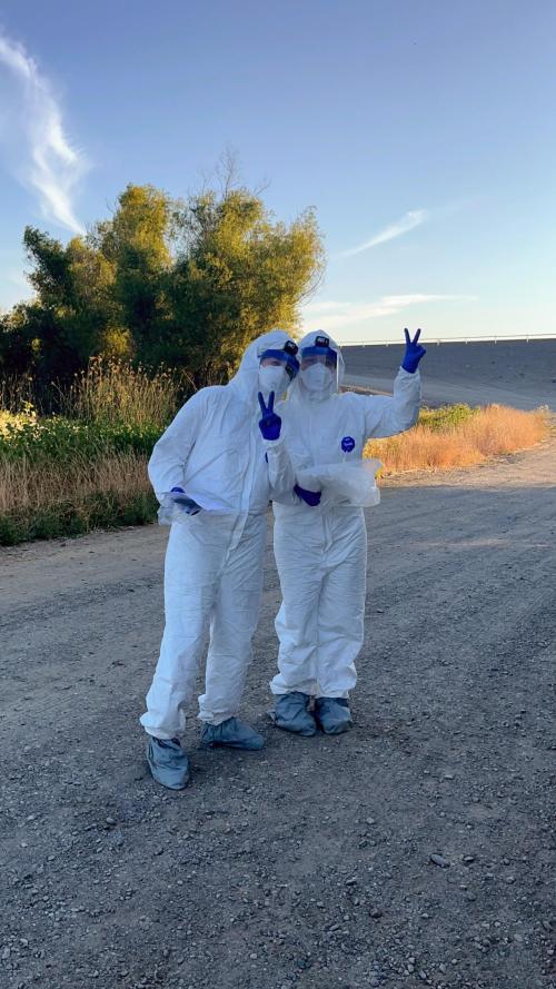 Two people in PPE