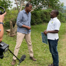 Bill Whitaker interviewing Uganda team